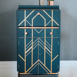 Petrol blue Art Deco cocktail cabinet with copper and gold geometrics